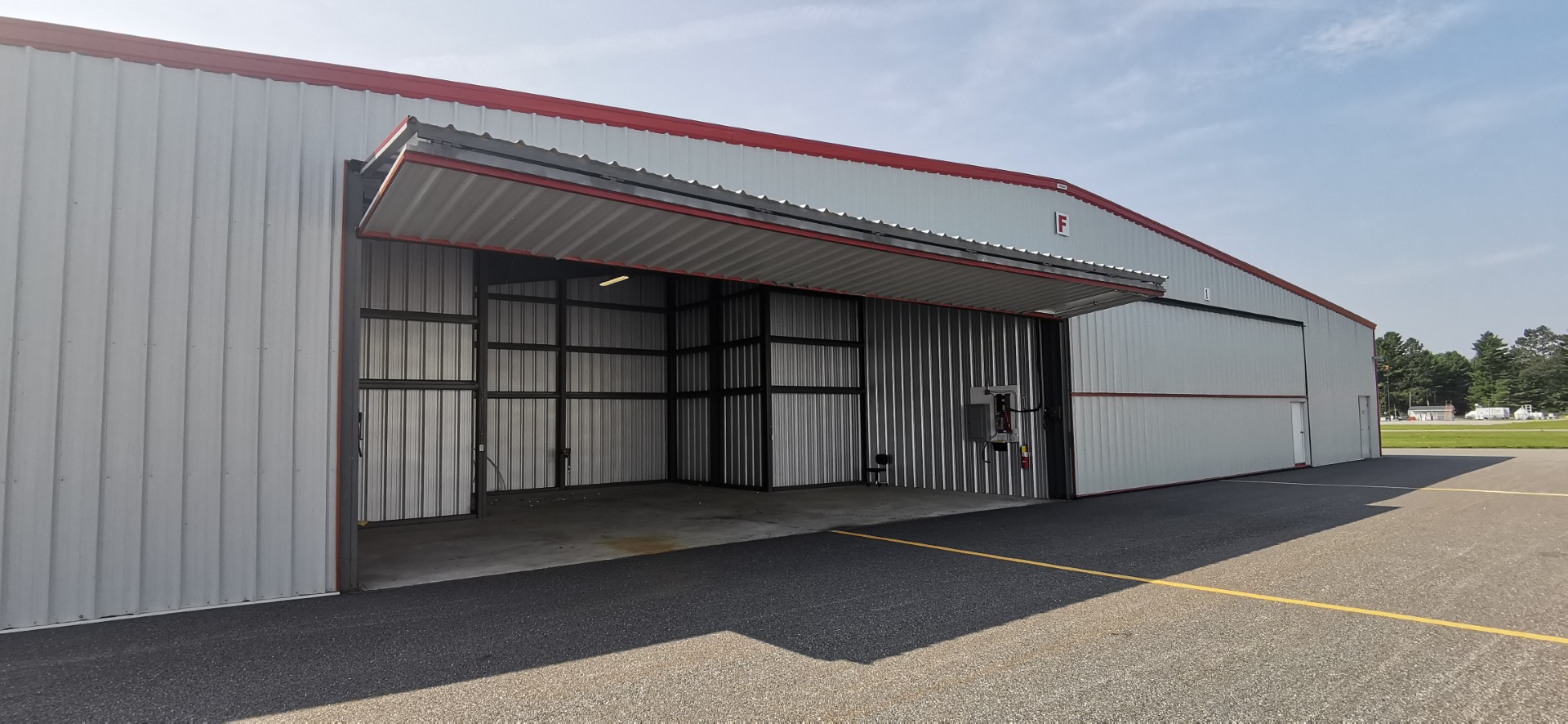 Image shows an airplane hangar.