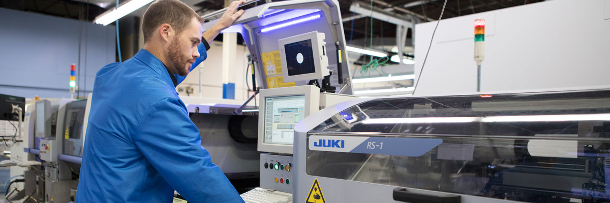 worker sets up a machine