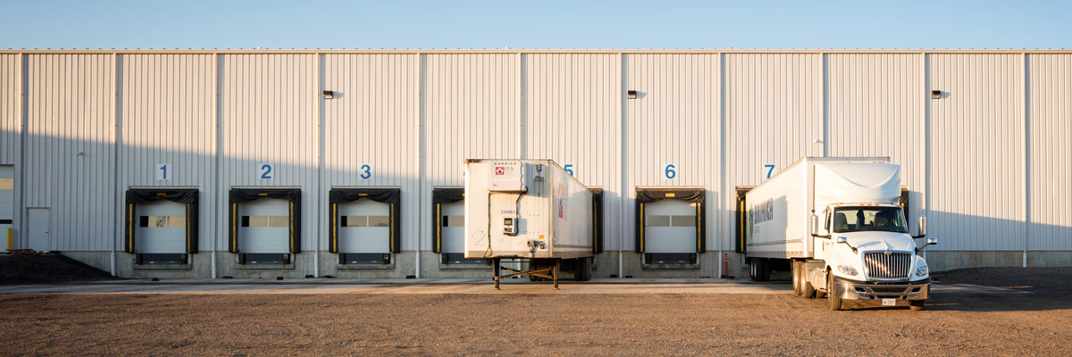 Truck and trailer at loading docks