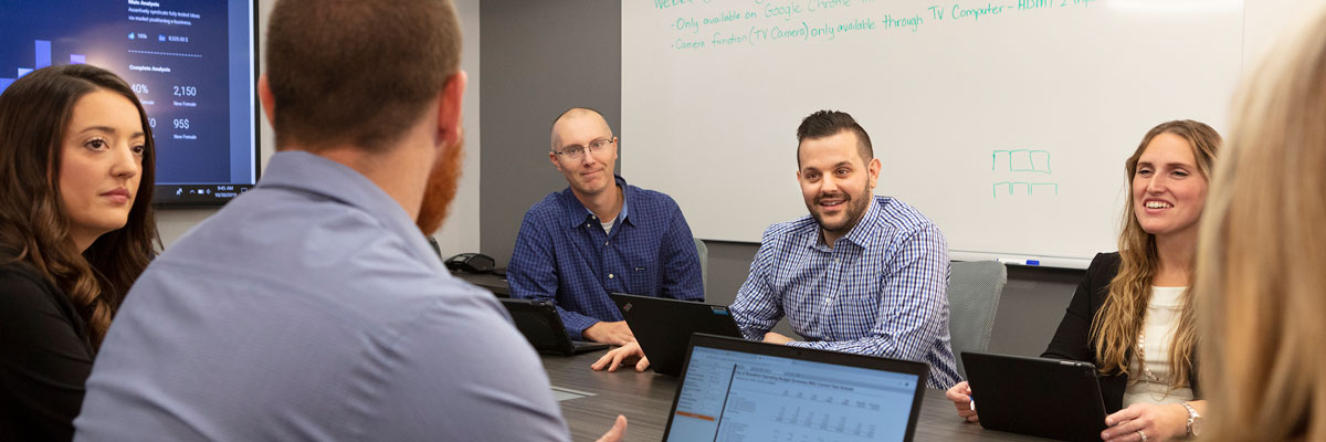 Group of people around a conference table