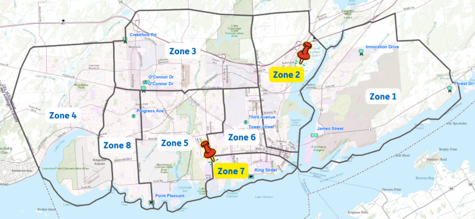 Map showing a city divided into Zones 1–8. Zones 2 and 7 are highlighted in yellow with red pushpins, while streets, waterways, and other zones are labeled but not highlighted.