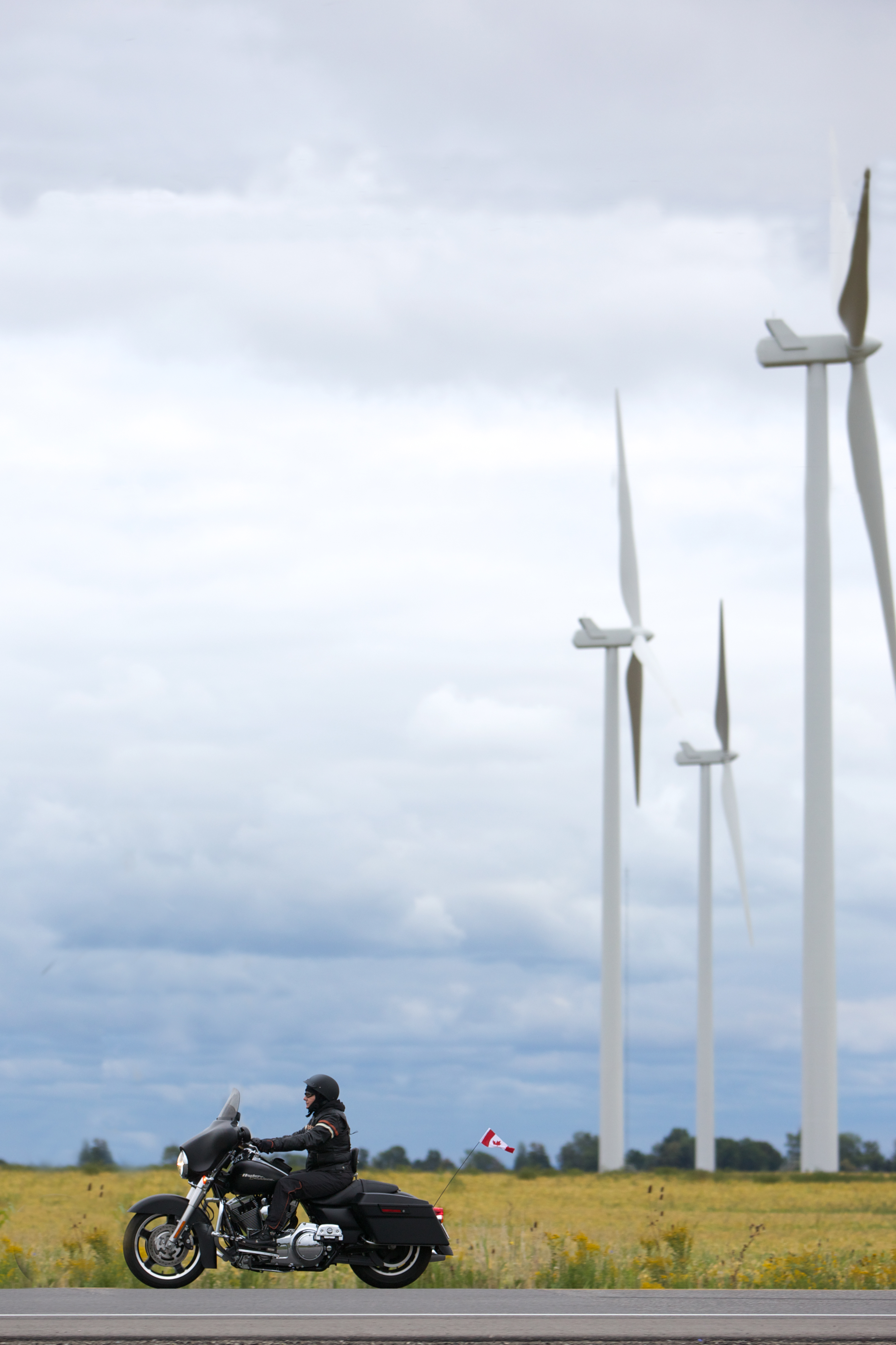 Motorcycling past wind turbines