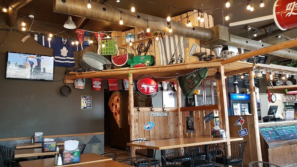local bar with tv on in the background