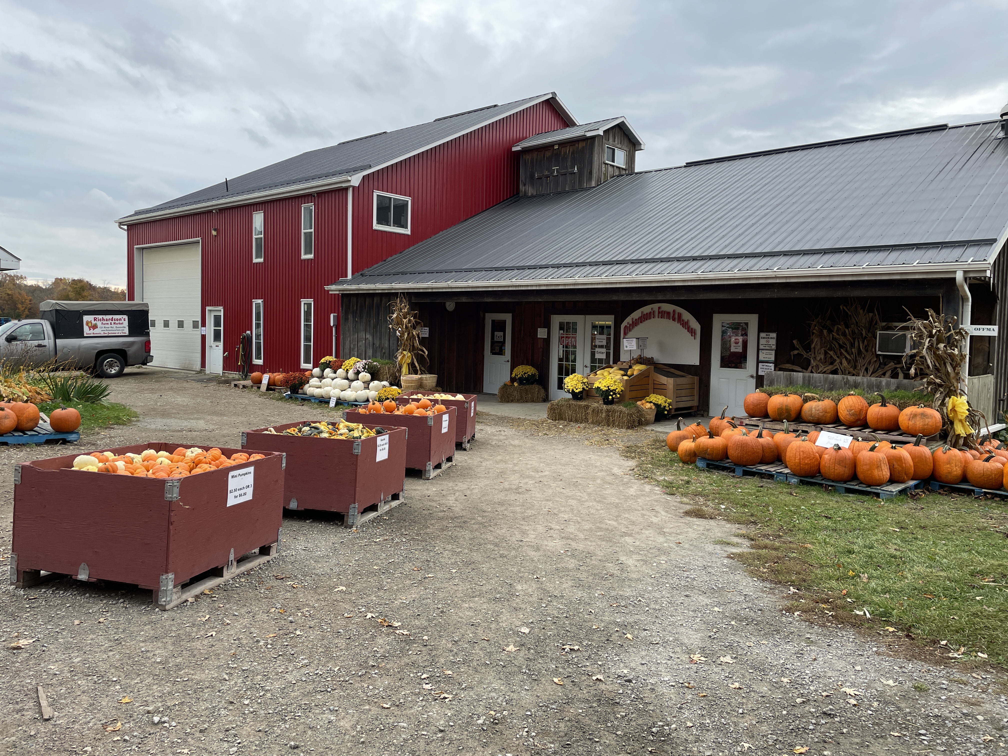 Fall produce on display outside an on-farm store