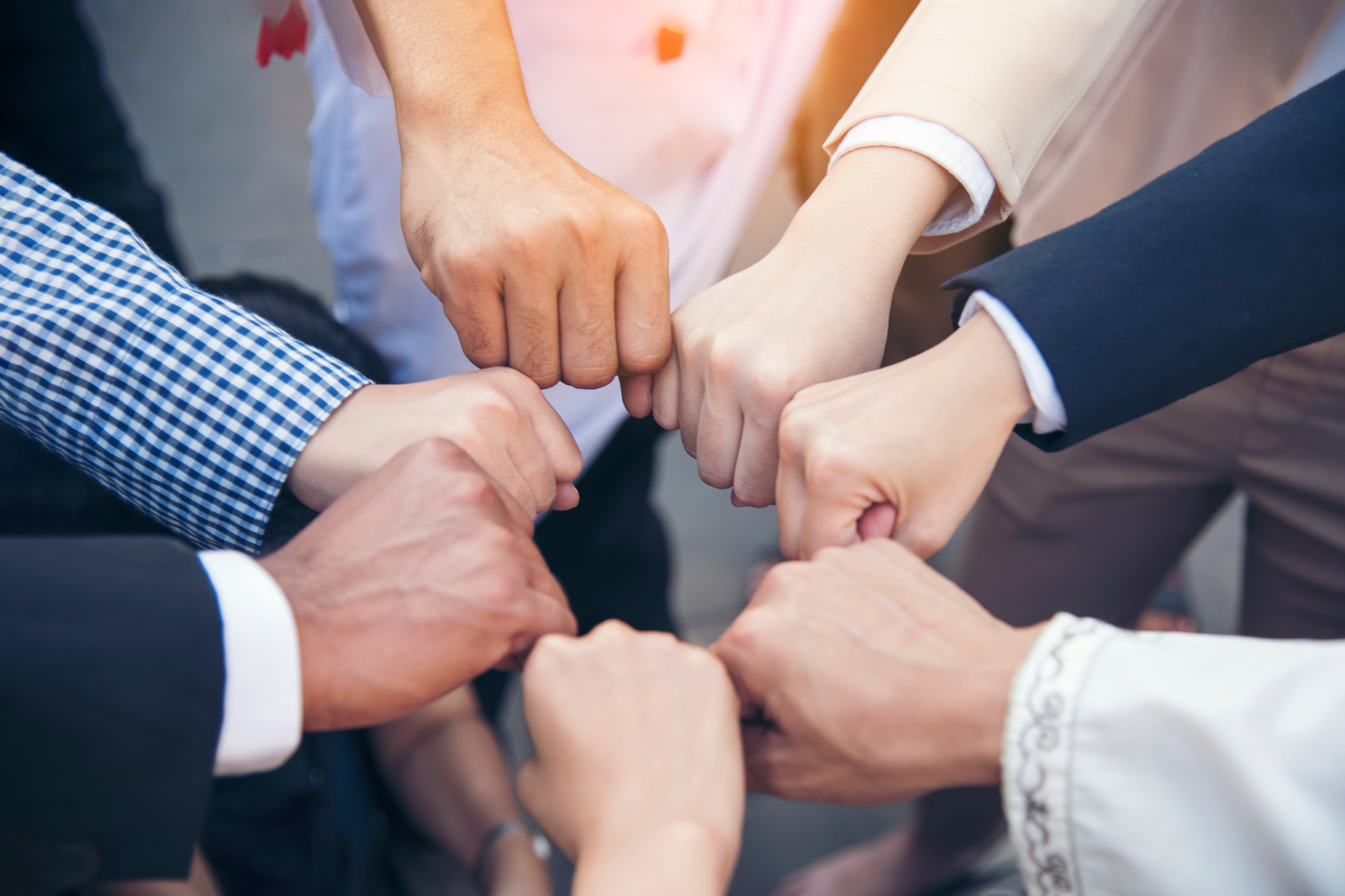 Group of hands in a circle