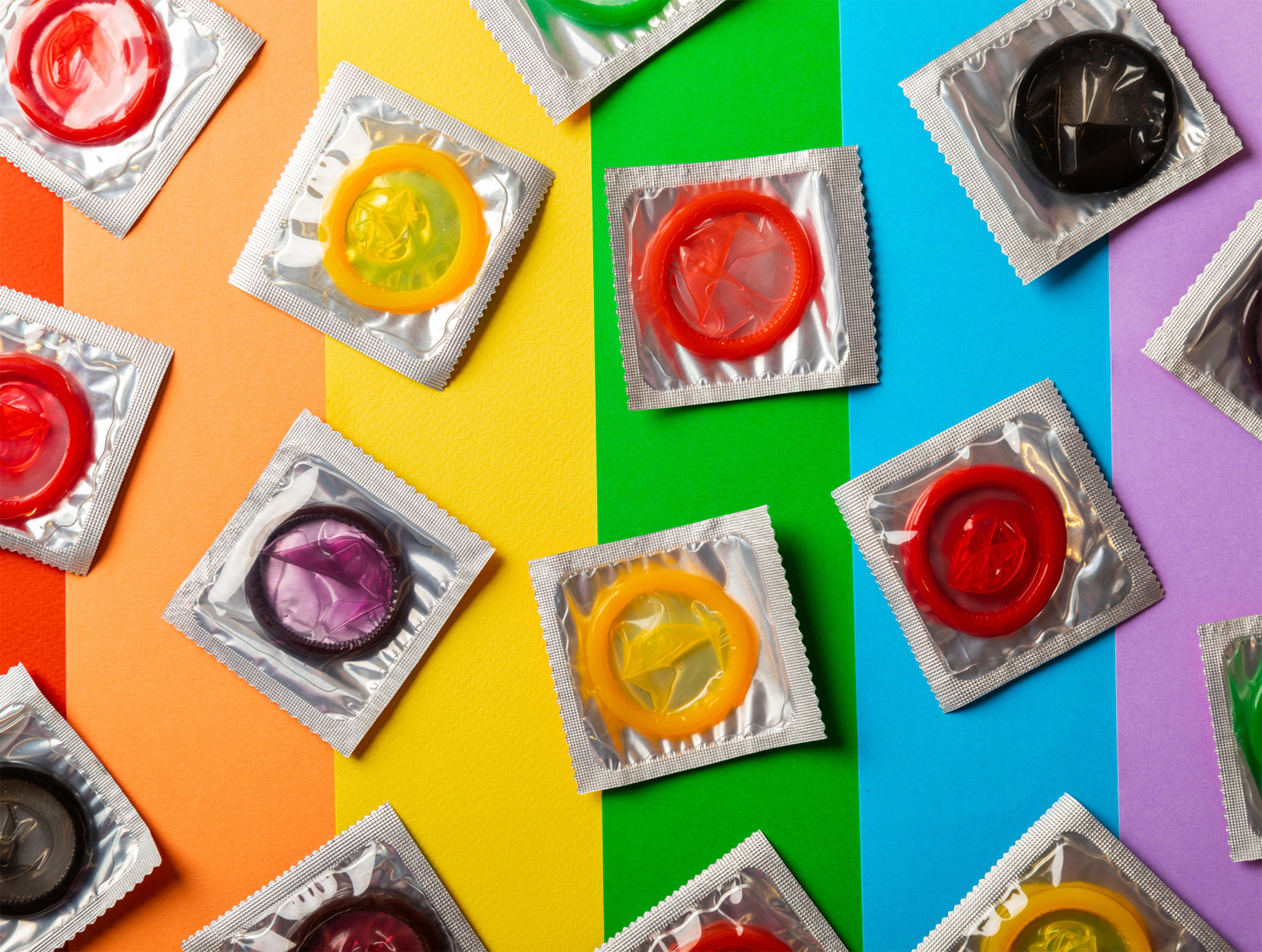 colourful background with condoms displayed