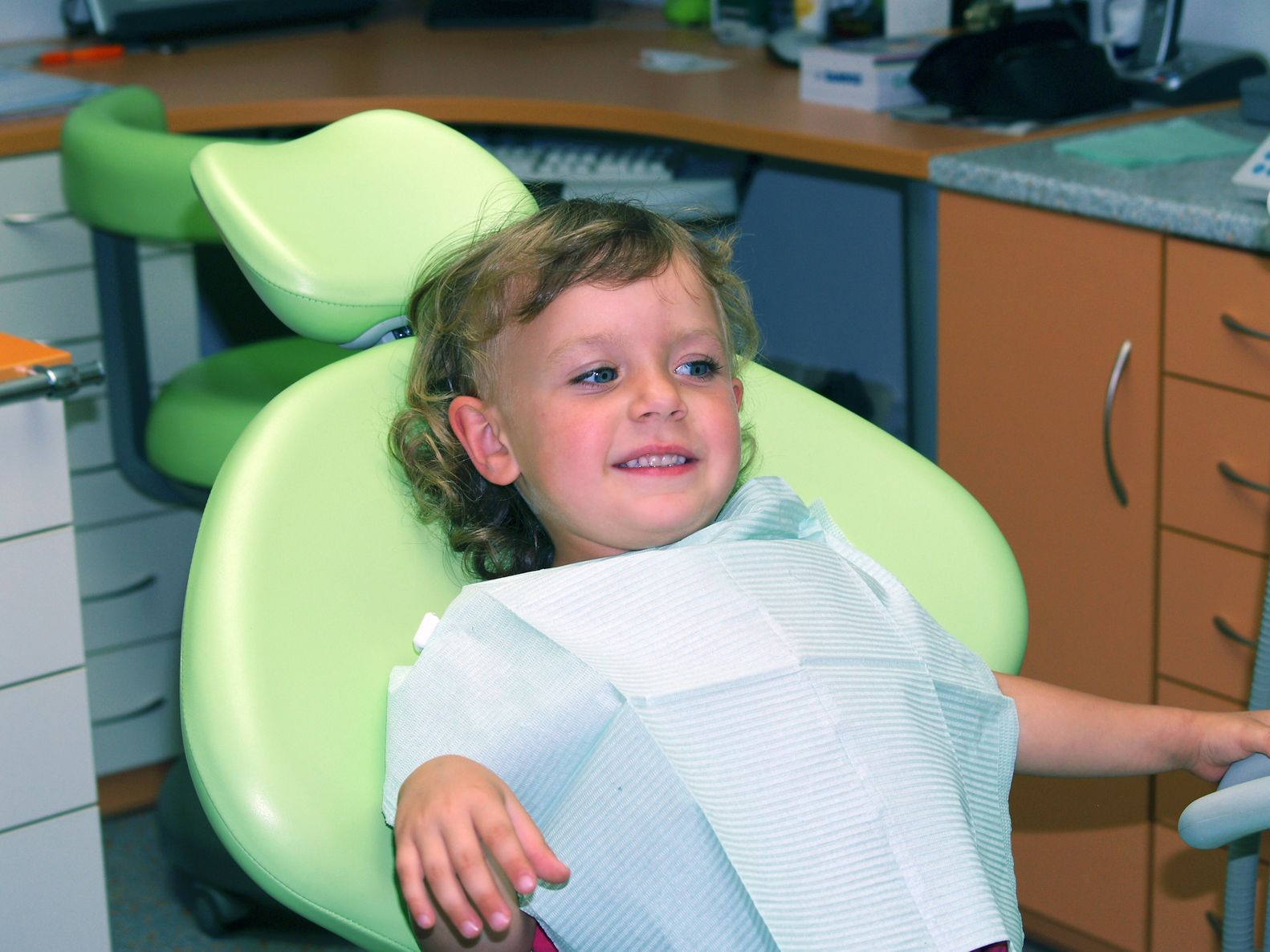 young girl in dental chair