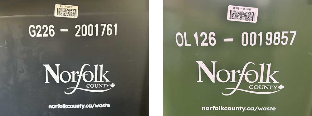 Photo of the information on the side of a grey and green waste cart